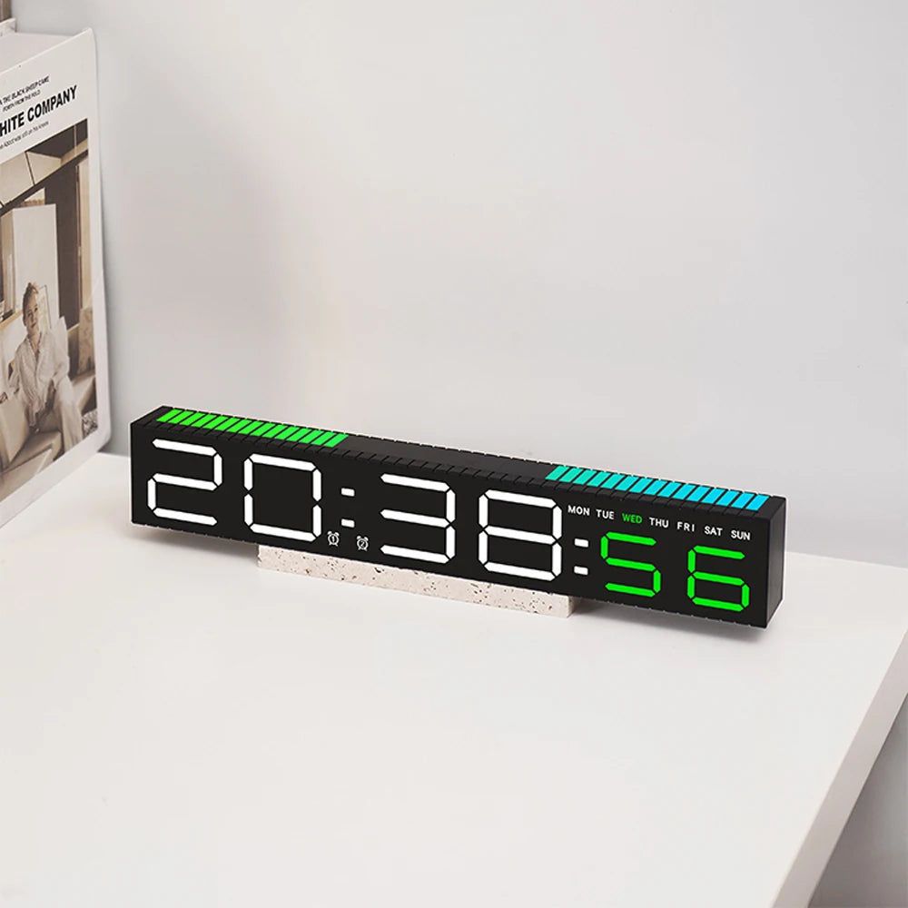 A black LED digital alarm clock displaying 20:38:56 on a white surface.