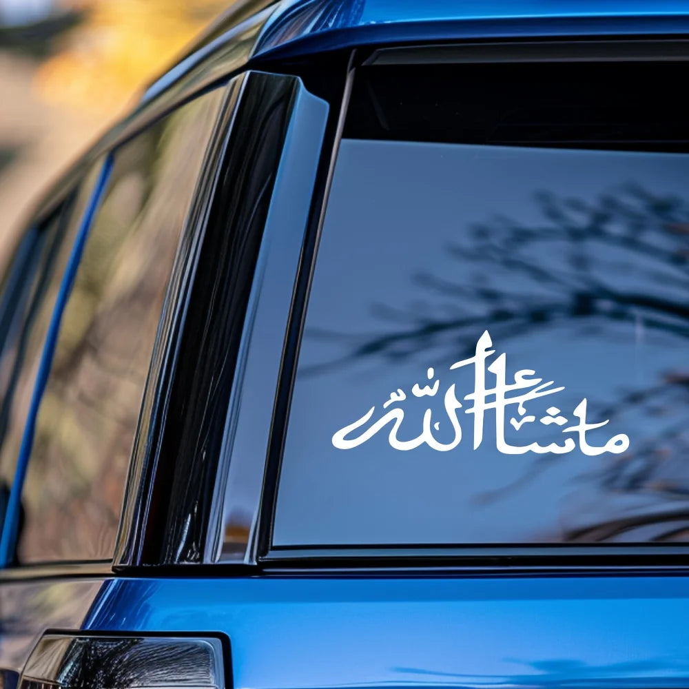 Close-up of a blue car window featuring white Masha'Allah Islamic calligraphy vinyl decal.