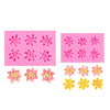 A set of pink and yellow lotus leaf fondant silicone molds for cake decorating.