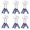 A set of blue shark foil balloons used for ocean-themed party decoration.