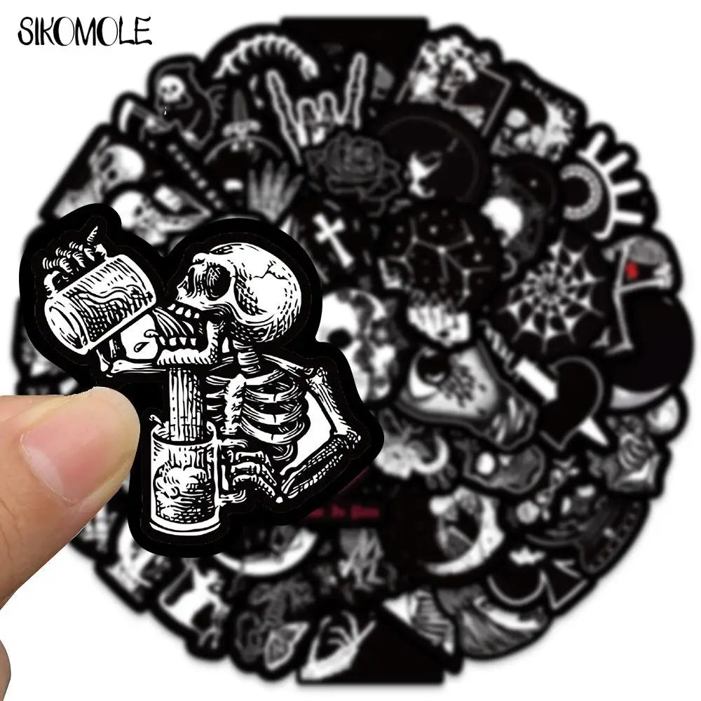 A black and white illustration of a skull and various decorative elements, likely cartoon stickers for decoration.