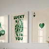 Three framed canvas prints featuring lucky heart symbols and the word you