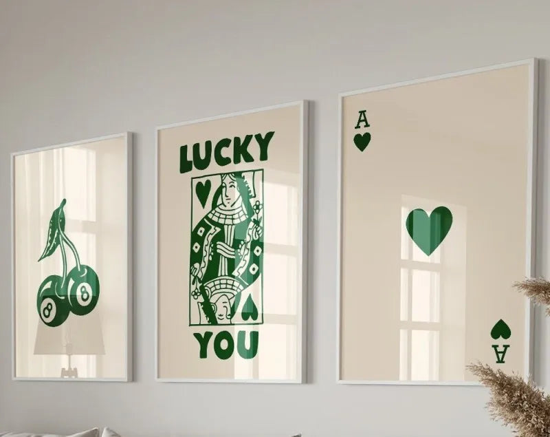 Three framed canvas prints featuring lucky heart symbols and the word you