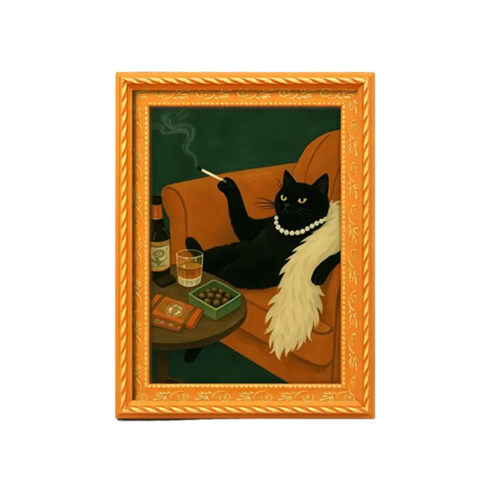 Vintage style wooden frame featuring a painting of a black cat sitting on an orange sofa.