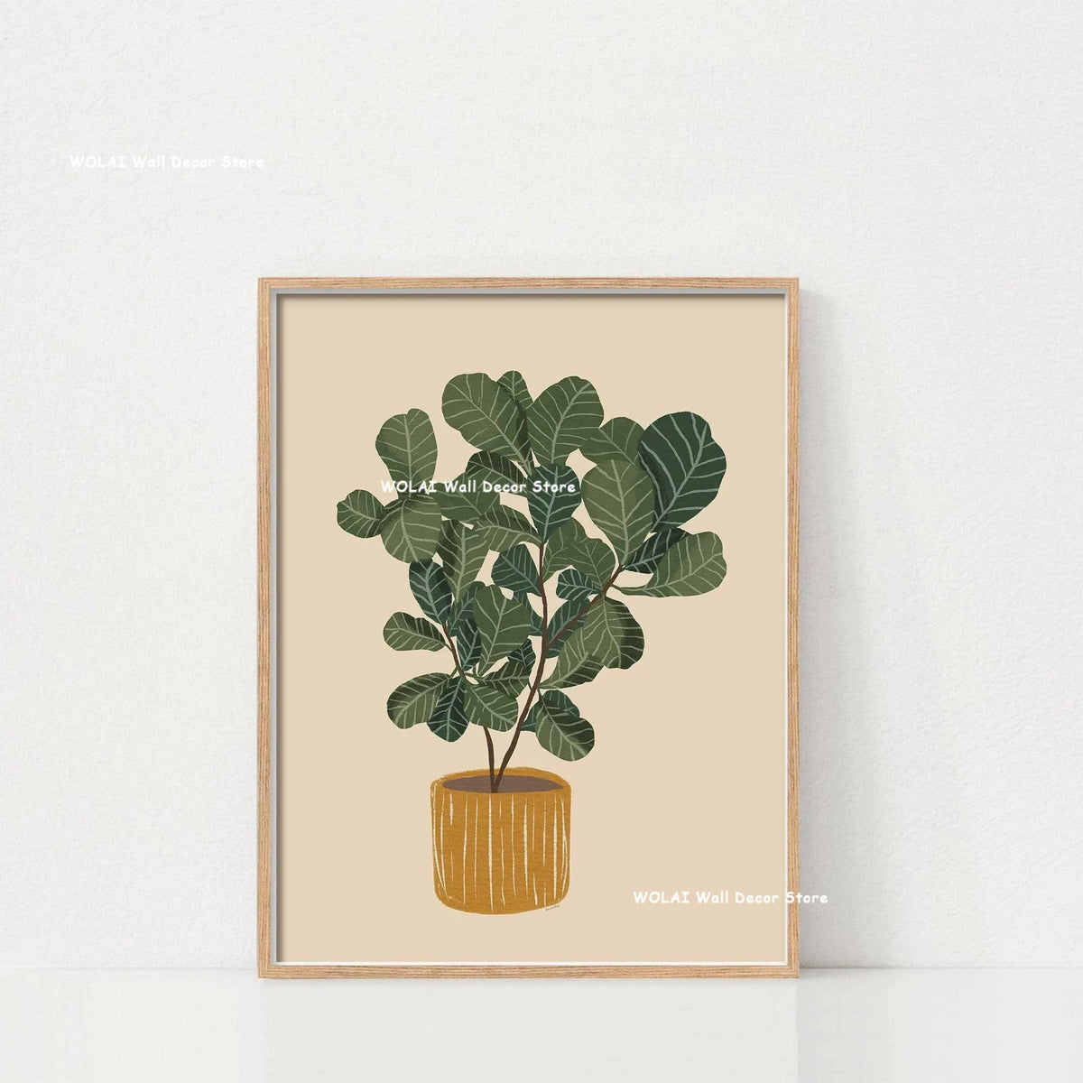 A framed botanical print featuring a lush green philodendron plant in a terracotta pot against a beige background.