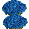 A dense bouquet of deep blue artificial roses used for weddings and home decor