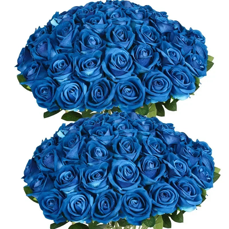 A dense bouquet of deep blue artificial roses used for weddings and home decor