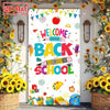 A colorful classroom door banner featuring the text Welcome Back to School decorated with apples, pencils, and school supplie