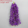 A long purple artificial wisteria flower garland measuring 60cm