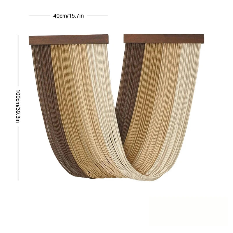 Boho macrame wall tapestry featuring vertical beige and brown woven fibers.
