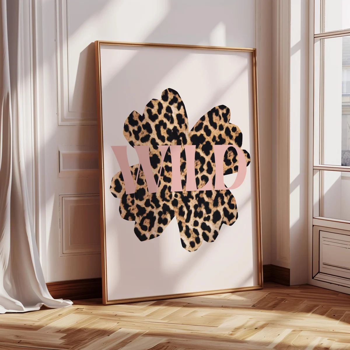 Pink leopard hibiscus canvas wall art framed in gold on a light pink wall