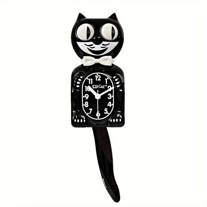 A black cartoon cat wall clock with a white face and swinging tail.