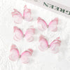 Pink and white translucent butterfly patches embroidered for crafts and decor