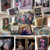 A collection of funny monkey canvas wall art prints displayed on a white wall.
