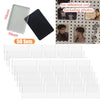 A set of clear and black acrylic magnetic photo holders for display