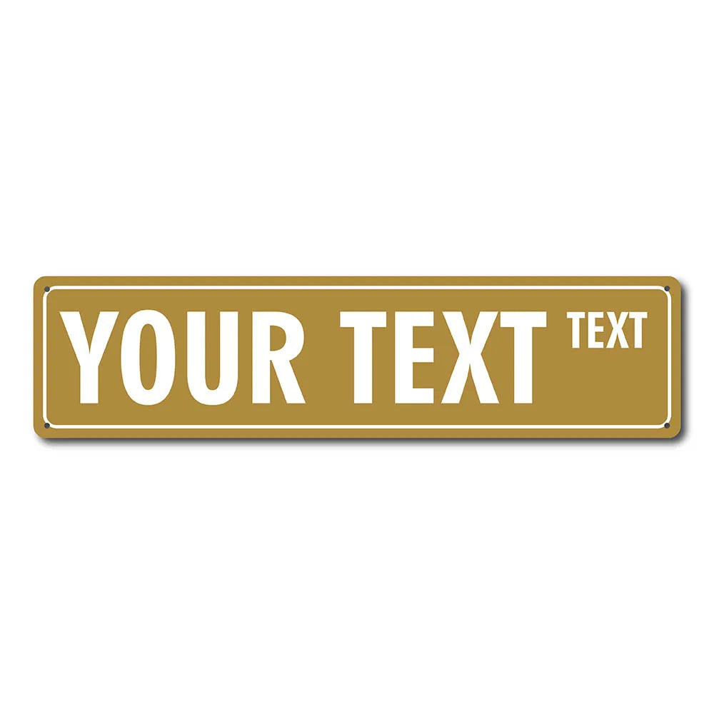 A rectangular brass-colored metal street sign with the text YOUR TEXT and a smaller word TEXT.