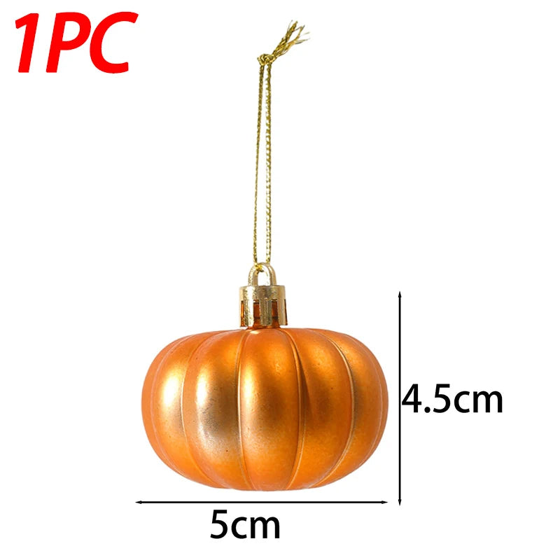 A single golden orange pumpkin hanging ornament with a wire loop.