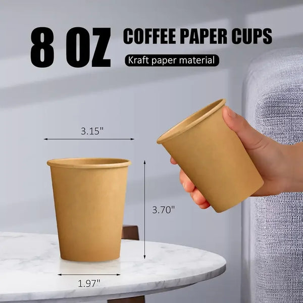 A hand holds a brown kraft paper cup, showing its size and material for serving coffee or other drinks.