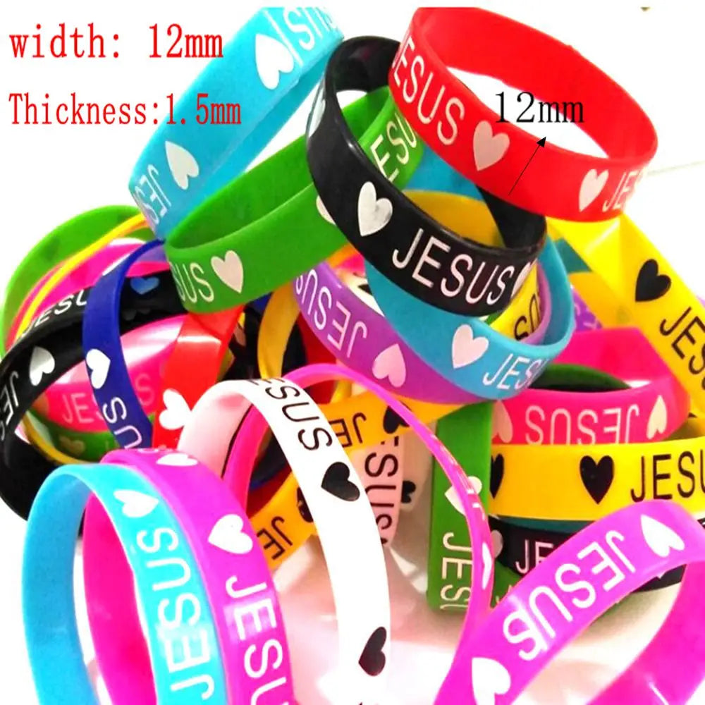 Assortment of silicone bracelets featuring the Jesus heart design in various colors like blue, green, pink, and red.