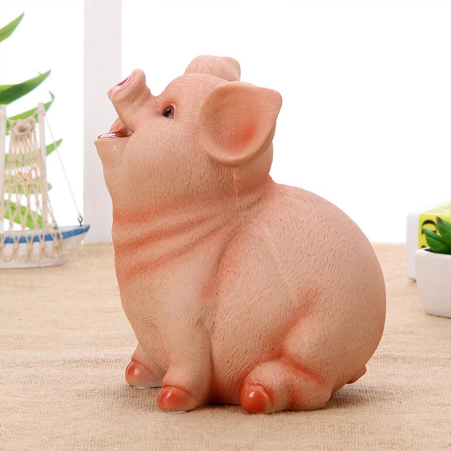 A small, pink resin piggy bank shaped like a pig sitting on a beige surface.