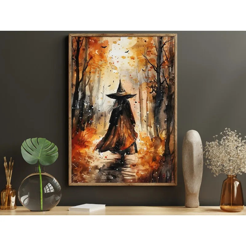 Canvas wall art depicting a dark witch silhouette standing in an autumnal forest with glowing light.