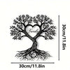 Black metal wall decor shaped like a family tree with a heart cutout and roots