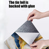 Hands peel back a tin foil backing to reveal a 3D marble effect self-adhesive wall sticker.