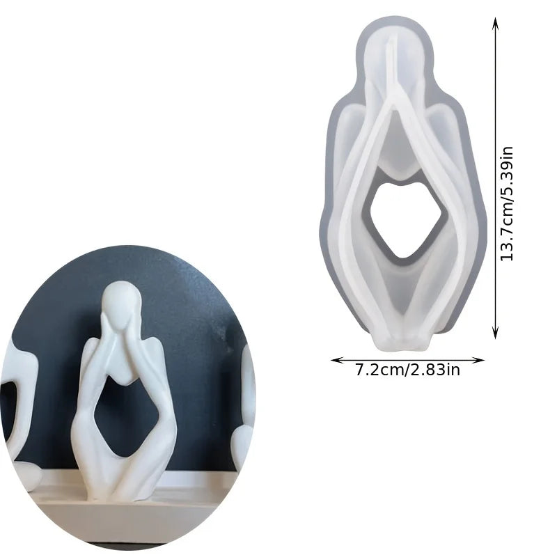 A clear silicone mold for resin art featuring an abstract, stylized figure design.
