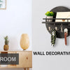 A circular wooden wall decorative design featuring a shelf and hooks for keys and small items.