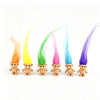 A collection of mini retro troll doll figures in various bright colors including orange, yellow, green, pink, blue, and purpl