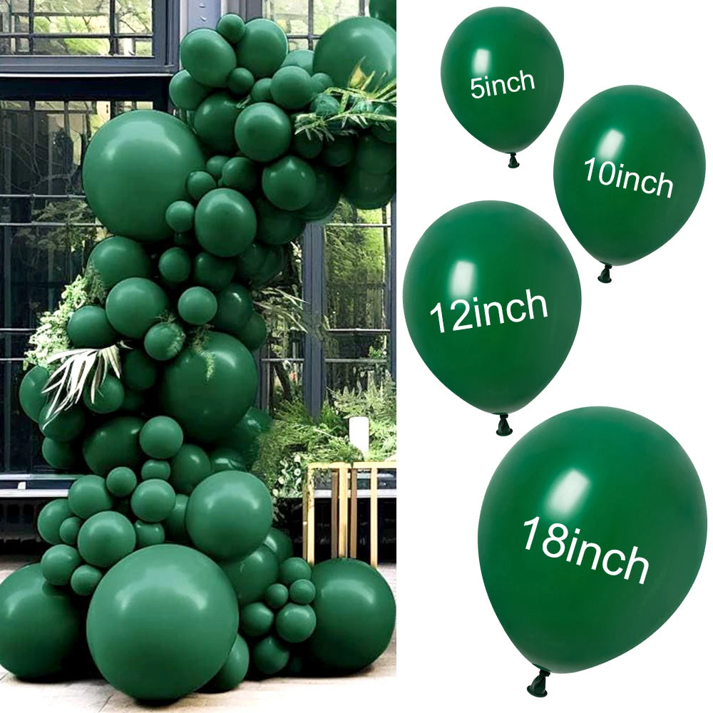 A large arrangement of jungle green latex balloons used for party decor.