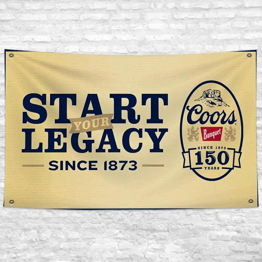 A beige banner with dark blue text that reads Start Your Legacy and Since 1873, featuring a Coors Banquet logo.