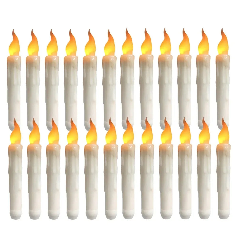 A row of white taper candles with yellow flames, used for flameless LED candles.