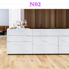 White marble contact paper applied to kitchen cabinetry and countertops in a modern interior setting.