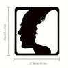 Black silhouette of a profile face on a square metal wall art print.
