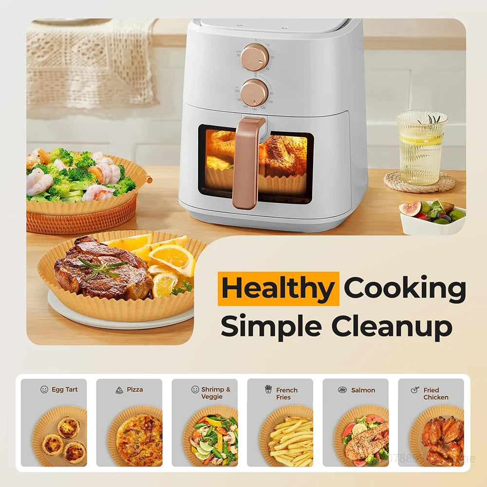 A white electric air fryer appliance with a glass window and controls is shown next to various food items.