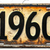 Letrero de aluminio vintage con el año 1960 grabado.