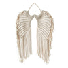 Handwoven angel wing macrame wall hanging in beige natural fiber
