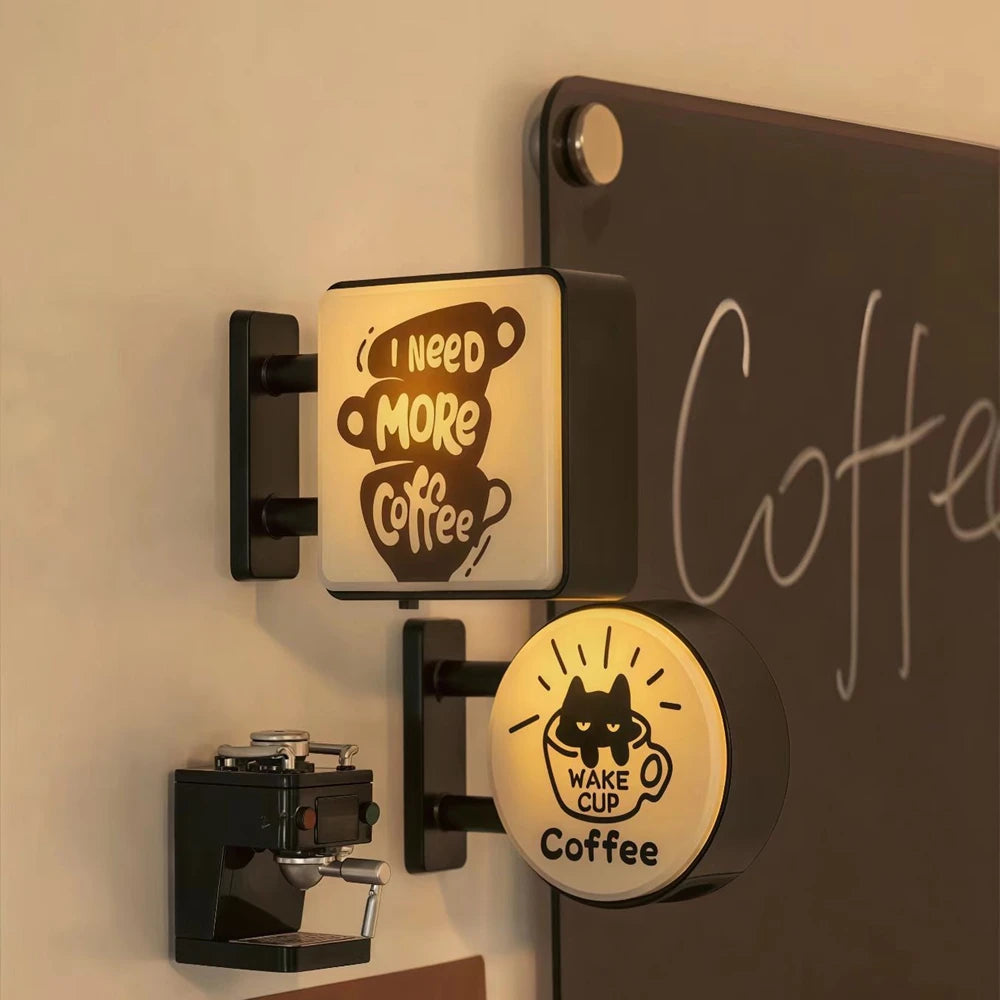 Magnetic fridge decor featuring a glowing sign that says I Need More Coffee and Wake Cup Coffee