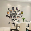 A wall collage featuring framed photos and leaves arranged in the shape of a family tree for a home decor display.