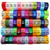 A collection of satin ribbon rolls in various colors and patterns, arranged in a row.