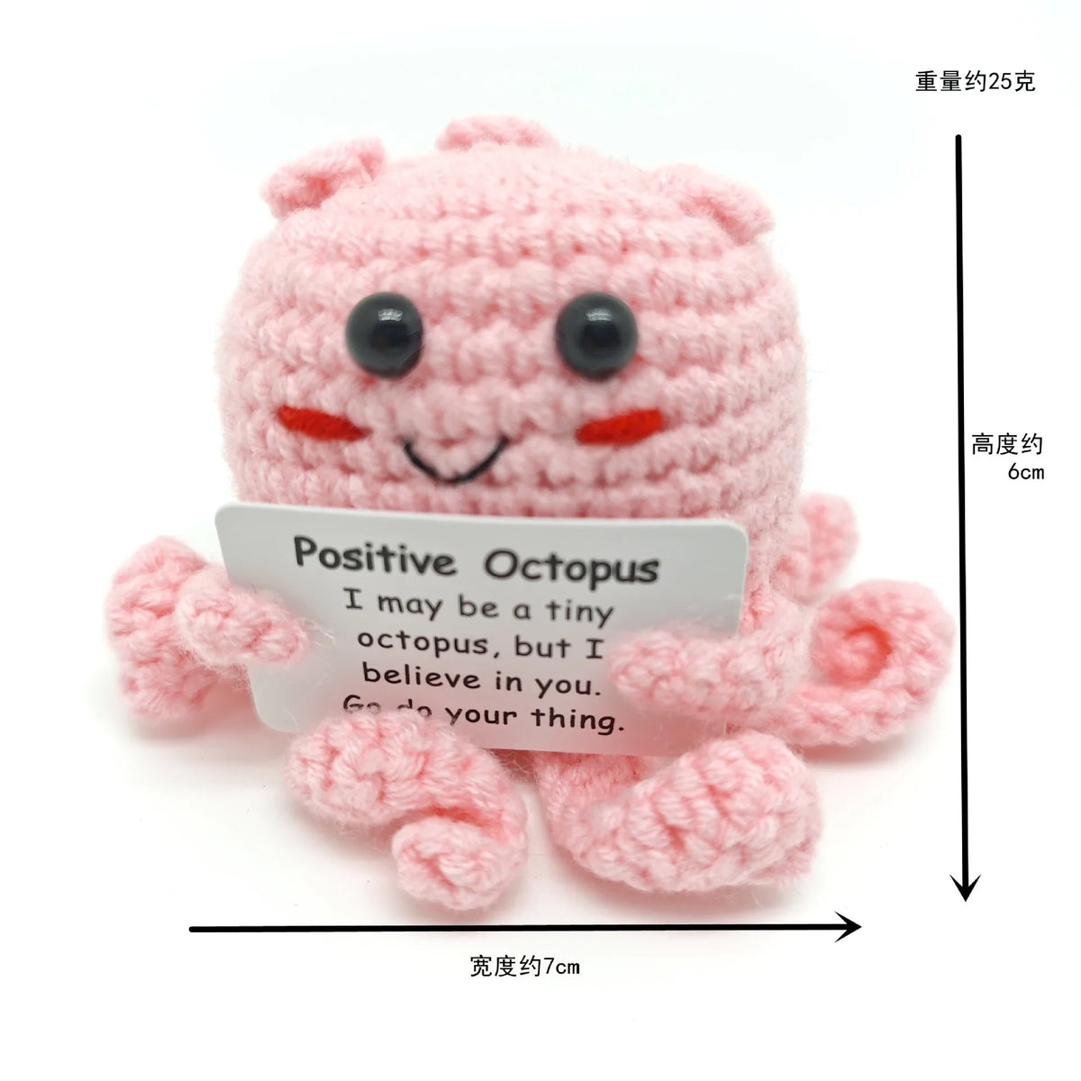Pink crochet octopus doll with a smiling face and an inspirational message card