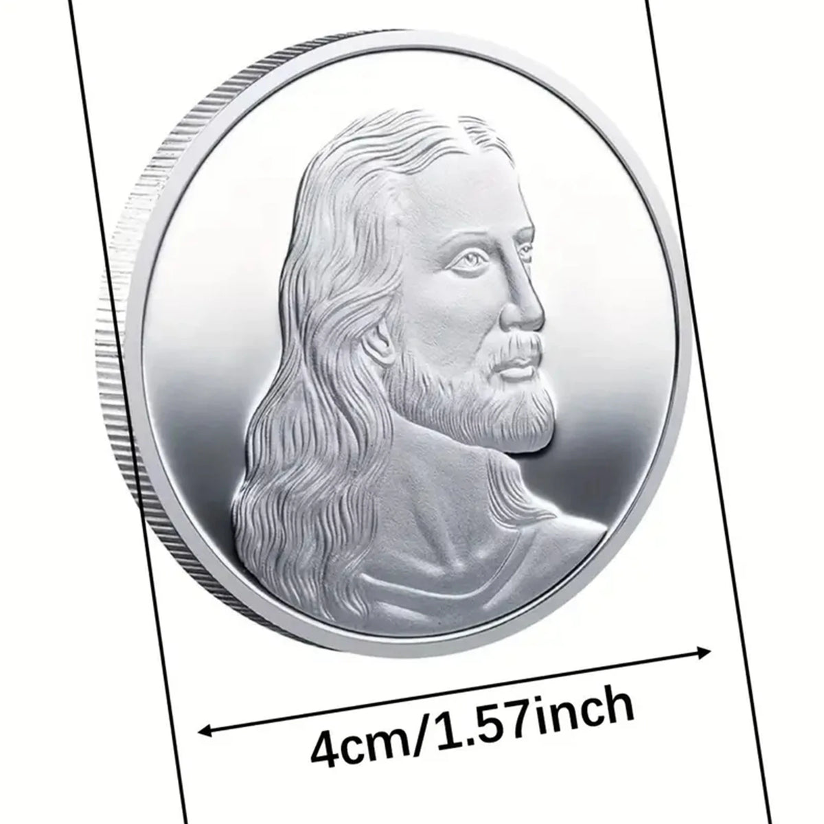 A silver commemorative metal coin featuring a profile portrait of Jesus Christ with long hair and a beard.