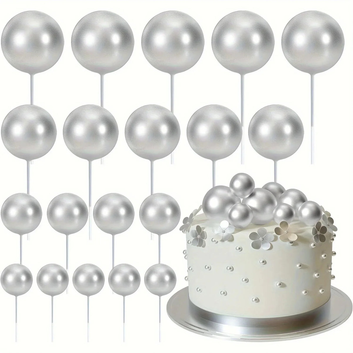 A collection of twenty silver foam ball cake toppers on white sticks arranged for party decorations.