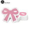 A set of twenty pink bow cupcake toppers on white paper, measuring 13x16cm.