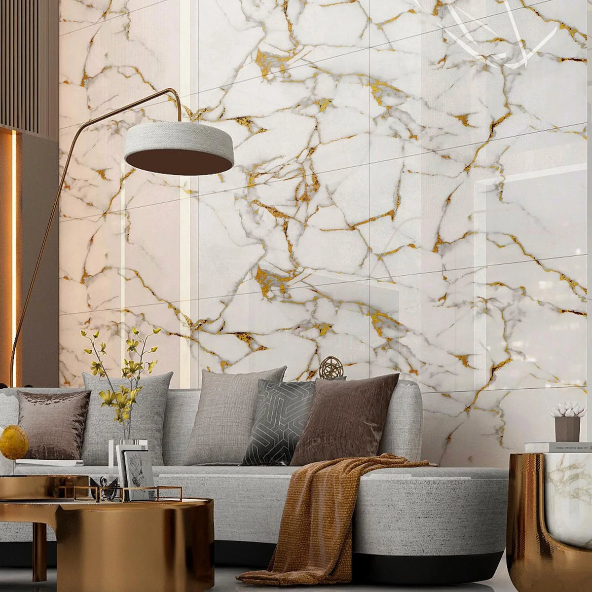 Interior design featuring a sofa and modern lighting against a background of gold veined marble wall tiles.