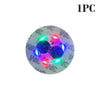A circular luminous LED coaster light featuring blue and pink illumination.