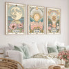 A set of three framed celestial tarot floral art prints featuring the moon sun and star in soft pastel tones