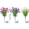 Zwei Sträuße künstlicher Morning Glory Blumen, einer rosa und lila, einer weiß und grün.