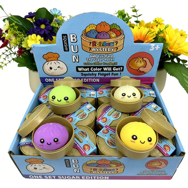A box of squishy dumpling stress relief toys in various colors and editions with a rainbow theme.
